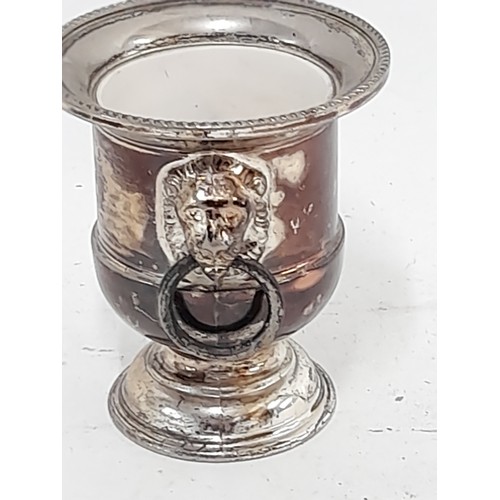 135 - Silver plate urn salt with lion head handles, 7.5cm high