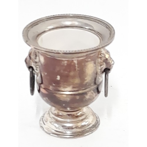 135 - Silver plate urn salt with lion head handles, 7.5cm high