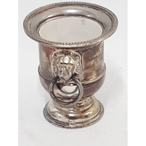 135 - Silver plate urn salt with lion head handles, 7.5cm high