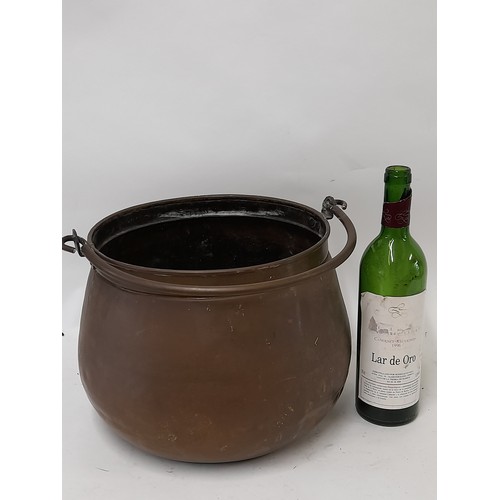 132 - Copper Brass cooking pot with swing handle, 23cm high plus handle x 32cm wide