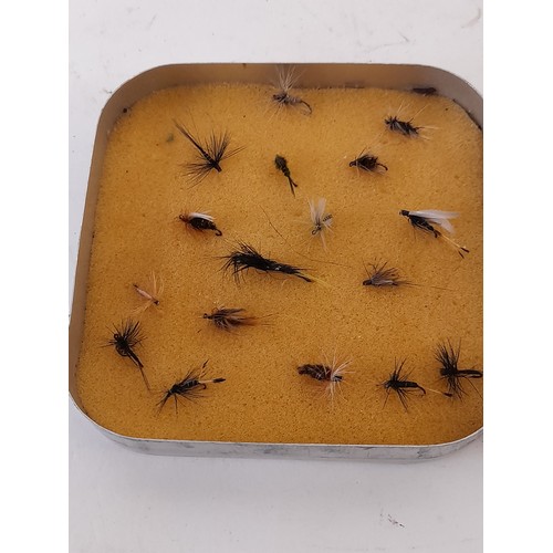 77 - Small alloy box containing fishing flies