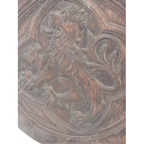 79 - Round Wood carving of a Rampant Lion, 31cm dia x 3cm deep