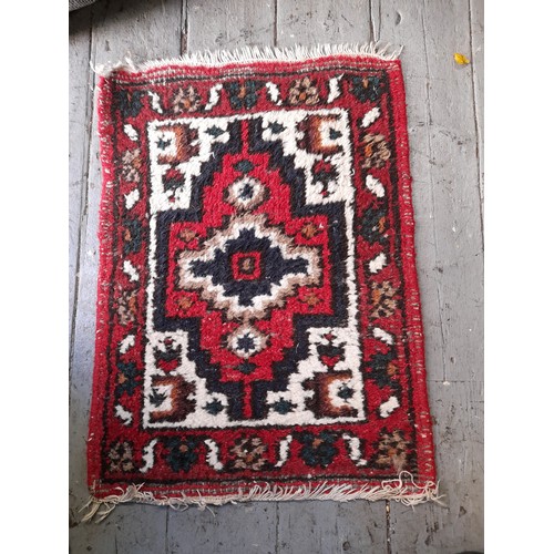 19 - Decorative Red Ground Rug,  70cm x 52cm