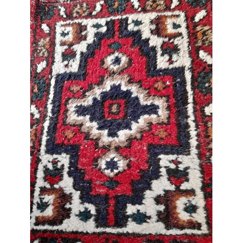 19 - Decorative Red Ground Rug,  70cm x 52cm