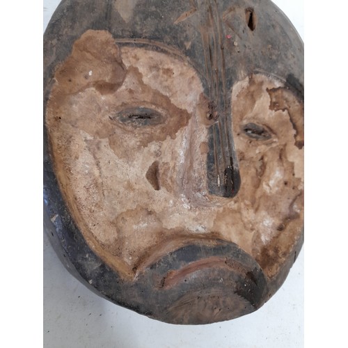 569 - Tribal Hand carved Face Mask oval with Sad Face 31cm x 26cm