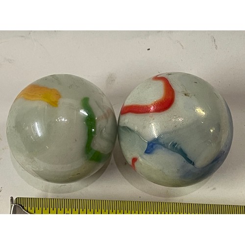 28 - Two Large China Marbles. (2)