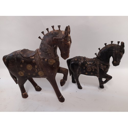 Two Decorative Carved wood Horses with Brass Decoration, largest 26cm