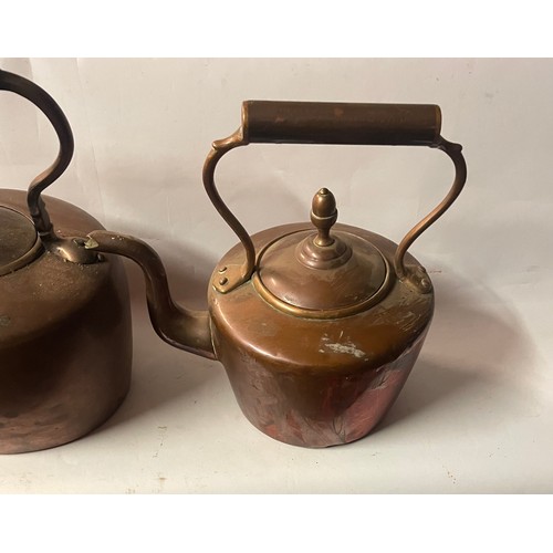 14 - Two Antique Copper Kettles. Largest 28cms High (2)