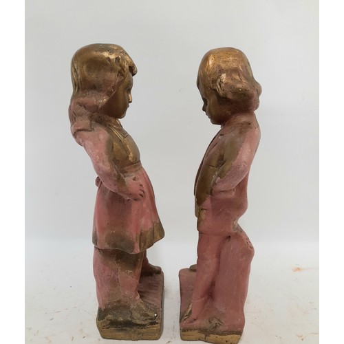 31 - Plaster Figures of a young Girl and Young Boy, 29cm high