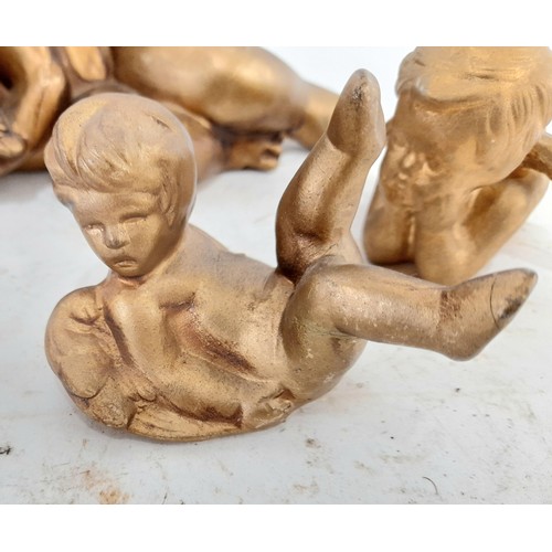 33 - Group of 4 Cherubs, largest, 21cm long x 10cm