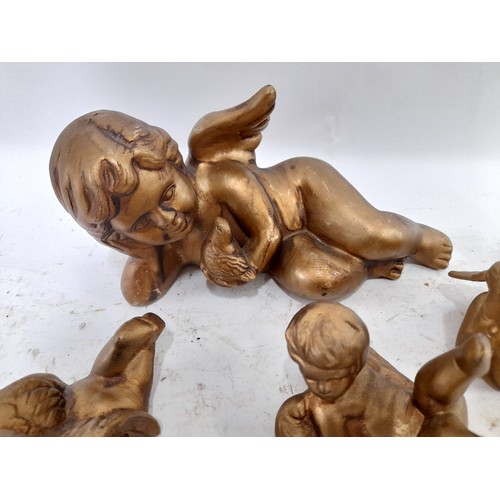 33 - Group of 4 Cherubs, largest, 21cm long x 10cm