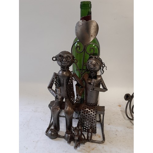 38 - 2 x Novelty metal bottle holders