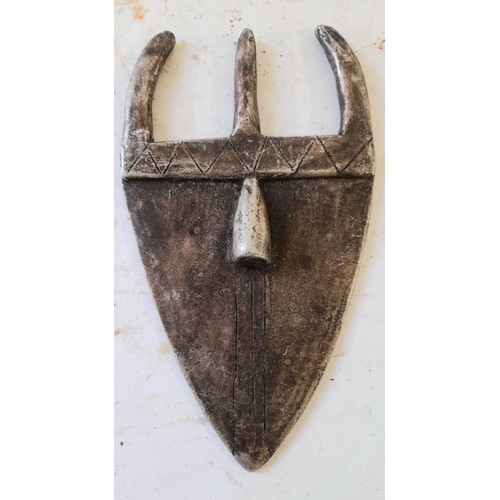 61 - Metal TOMA Mask 16cm x 9.5cm and a Tribal Bracelet, 10cm wide