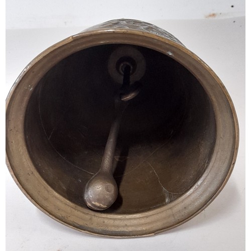 134 - Brass Bell with relief decoration and latin inscription, 21cm x 13cm