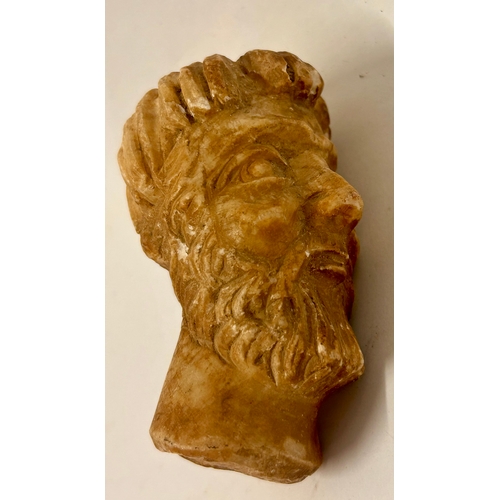 244 - Small Hand Carved Figure Of A Head. 9cm x 7cm.