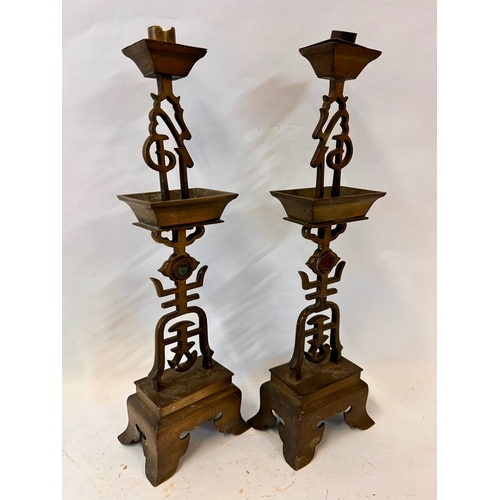 272 - Pair Of Brass Decorative Chinese Candle Sticks Displaying Coloured Stones. 42cm x 13cm x 9cm.  (2)