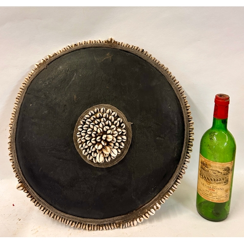 470 - Decorative Tribal Hand Held Shield With Cowrie Decoration. 42cm Circular.