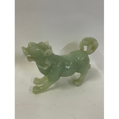 331 - Chinese Carved Jade Foo Dog Figure. 15 x 9 cms