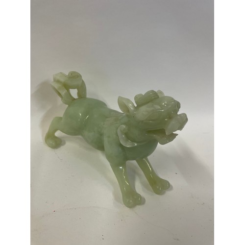 331 - Chinese Carved Jade Foo Dog Figure. 15 x 9 cms