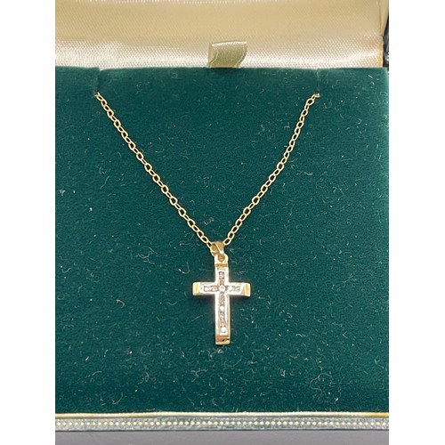 413 - 9ct Gold With Small Diamond Cross On A 9ct Gold Chain.
1.6g