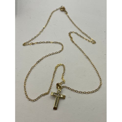 413 - 9ct Gold With Small Diamond Cross On A 9ct Gold Chain.
1.6g