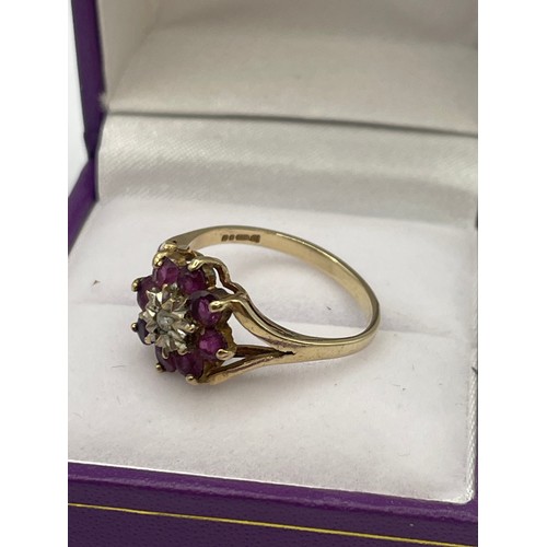 434 - 9ct Gold Hallmarked Ruby And Diamond Flower Ring. 2.3g Size M 1/2.