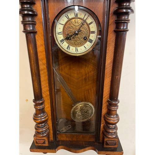 49 - Antique Vienna Wall Clock With Key And Pendulum. 100 X 39 X 19 cms