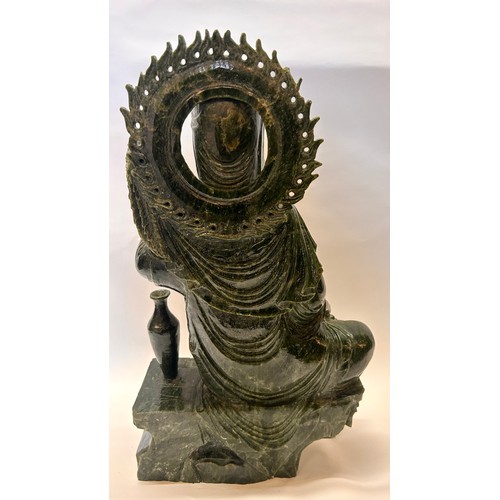 589 - A Large Chinese Dark Green Jade Seated Figure Of Guanyin Holding A Umbrella And Beads. 53 x 31 x 22 ... 