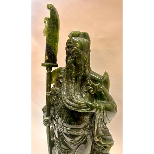 594 - A Large Chinese Dark Green Jade (Possibly Spinach Jade) Figure Of A General 51cm x 18cm x 13cm.