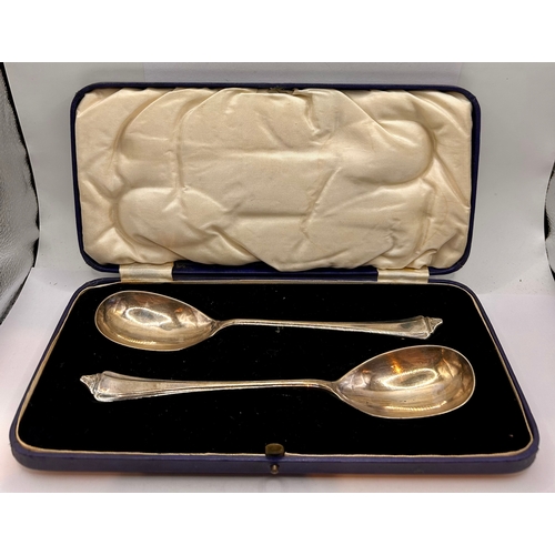 15 - Pair Of Large Silver Hallmarked Serving Spoons In Case. 28cm x 14cm x 3.5cm. 127grms