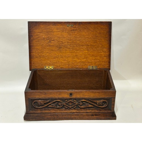 42 - Oak decorative hand carved box. With lock. (Key missing) Measures 35cm long x 21.5cm deep x 13.5cm h... 