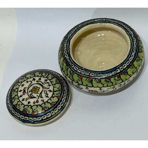 47 - Hand painted Iznik Style pottery bowl with lid. Measures 1