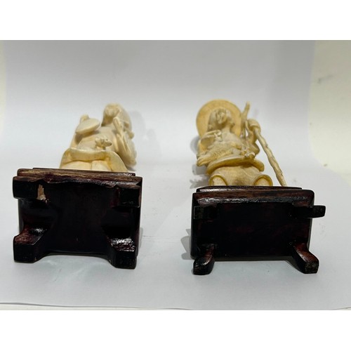 48 - Two Chinese Bone figures on wooden bases. Both male. One fisherman and one other. Both measure 15 Cm... 