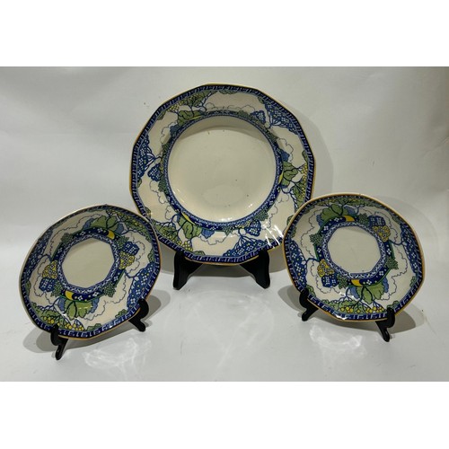 40 - Vintage Royal Doulton Merryweather salad bowl and two saucers (x3). with stands. Largest measuring 2... 