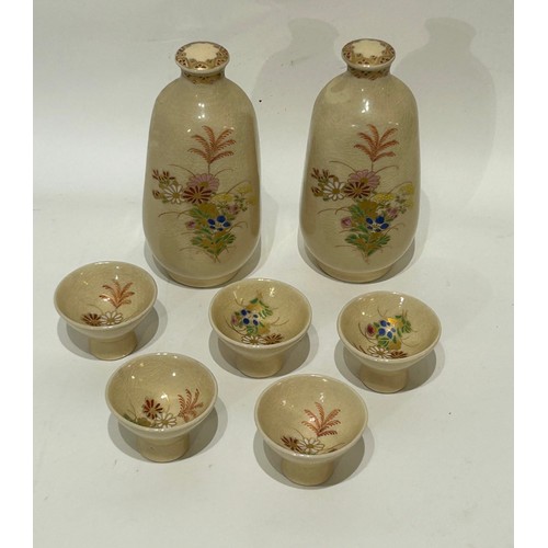 39 - Two Antique, possibly Meiji Japanese Satsuma sake bottles with floral decoration complete with lids ... 