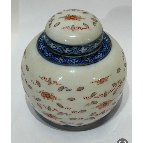 44 - Blue and white Oriental ginger jar/vase. Measures 11cm high x 11cm at its widest