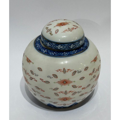 44 - Blue and white Oriental ginger jar/vase. Measures 11cm high x 11cm at its widest