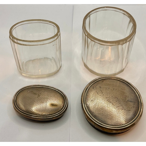 26 - Two Glass Silver Hallmarked Topped Pots, Largest 9.5cm x 8.5cm.