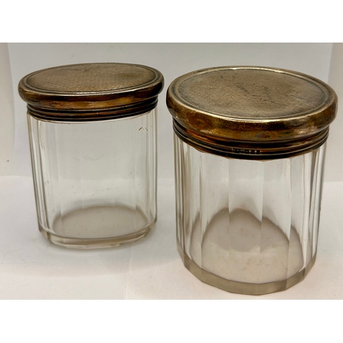 26 - Two Glass Silver Hallmarked Topped Pots, Largest 9.5cm x 8.5cm.