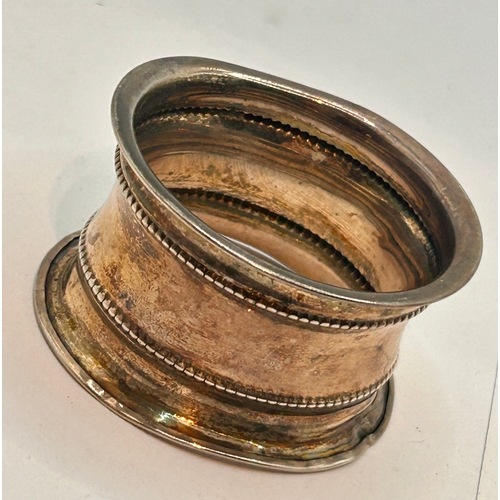 28 - Two Pieces Of Silver Hallmarked to Include One Napkin Ring Along With A Salt. Largest 5cm x 3cm. (2)