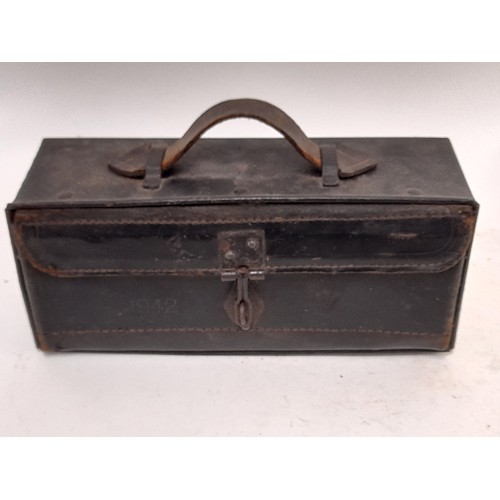 94 - Military Dispatch Riders Tool Box, Metal with leather Lid dated 1942 with Broad Arrow27cm x 9cm x 11... 