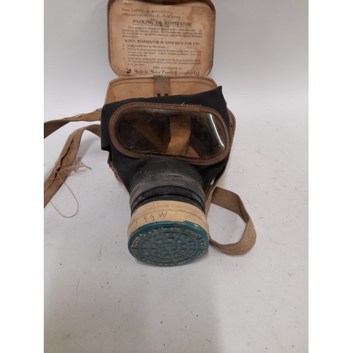 111 - WW2 Period Gas Mask in Metal Box with instructions