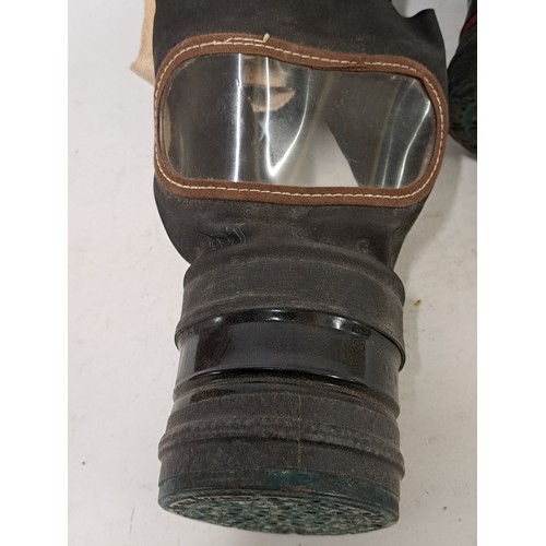 112 - 2 x Gas Masks, one in a case