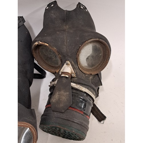 112 - 2 x Gas Masks, one in a case