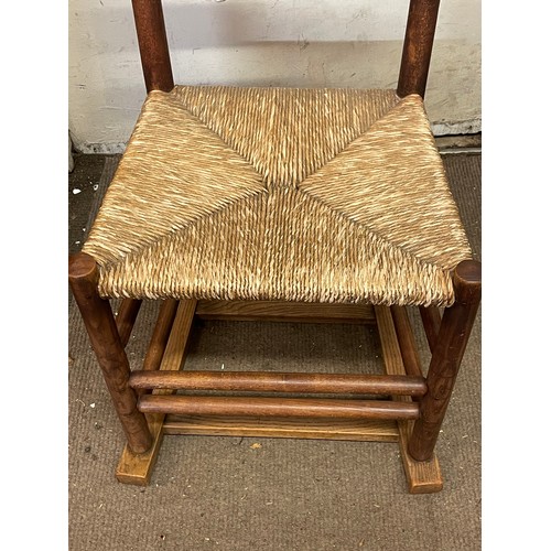 455 - Antique Ladder Back Rocking Chair With With Rush Seat.