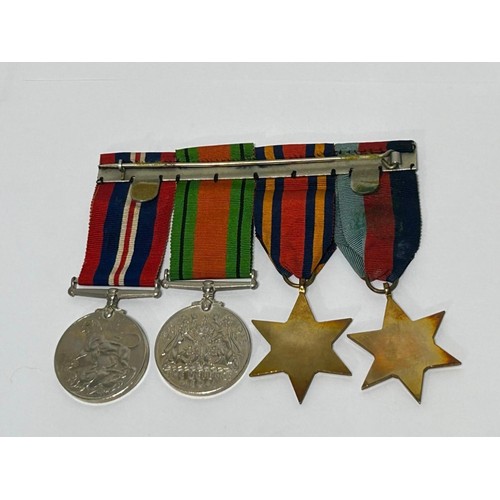 122 - A group of full sized WW2 Medals mounted, to include The Burma star, The 1939-1945 star , The defenc... 