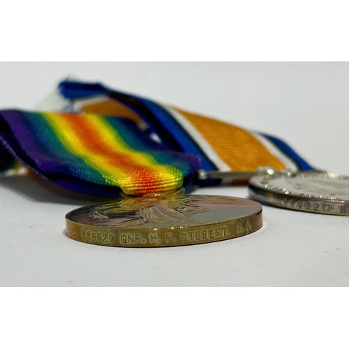 128 - Pair of WW1 full size Medals on ribbon to include, Victory medal and British war Medal (x2) Named to... 