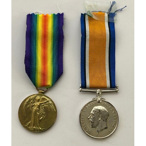 129 - Pair of Full sized  WW1 medals on ribbon to include a Victory medal and  British war medal (x2) Name... 