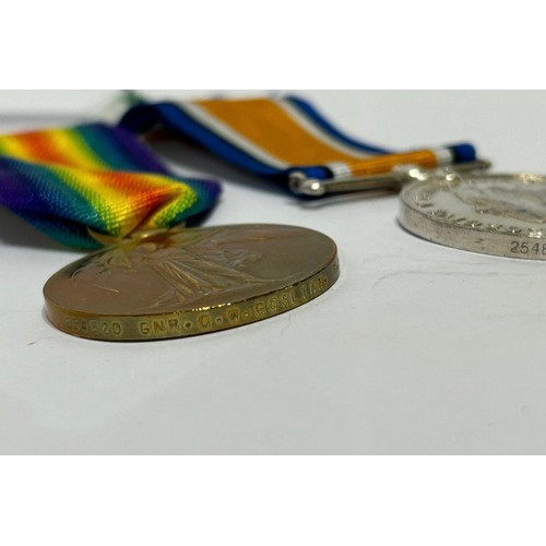 129 - Pair of Full sized  WW1 medals on ribbon to include a Victory medal and  British war medal (x2) Name... 