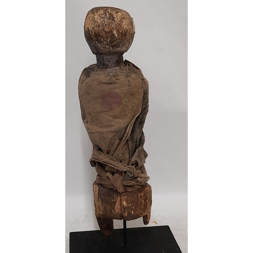 416 - FON Fetish Figure on Stand with remains of Blue pigment to face, 47cm high x 12cm wide